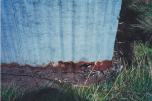 Rusty corrugated iron, since repaired, Photo Jerry Gregg 2002