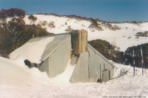 Photo John Purves. Mawsons Hut KNP under snow 1991.
