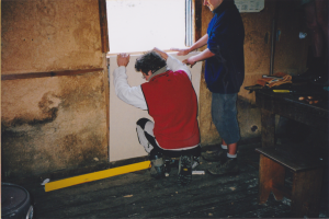 Workparty 2004; installing new wall panel; K. Wild