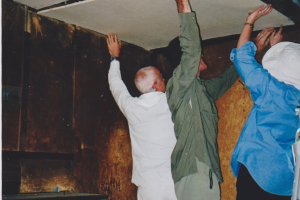 Workparty 2004; all hands installing ceiling cladding, white shirt Ken wild, green Phil Rylatt; K. Wild