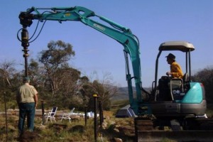 Drilling the post holes