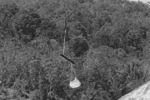 Navy helicopter delivering new log note drogue chute, photo John Hamilton