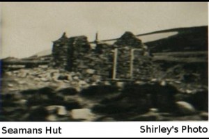 The only known photo of Seamans Hut being built.