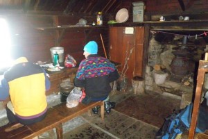 The old stove - Sandy Lolicato enjoying lunch out of the wind - &#169;Ian Frakes, 2011