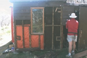 Greg Thompson repairing structure of South Wall; HMO South, 2005