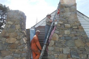 Bob Salijevic (then HMO Namadgi) and Simon Buckpitt (current) painting around chimney, photo John Allen Oct 2014.